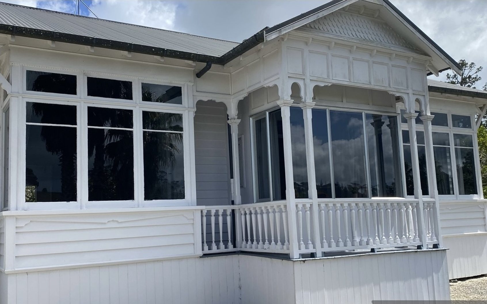 After: villa in scaffold, then the finished white villa
